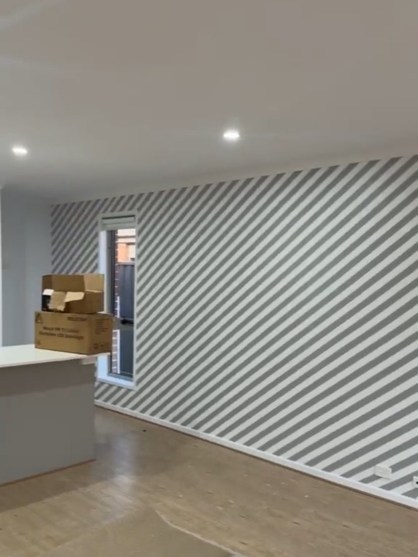 Striped feature wall completed by Hazara Painting & Decorating