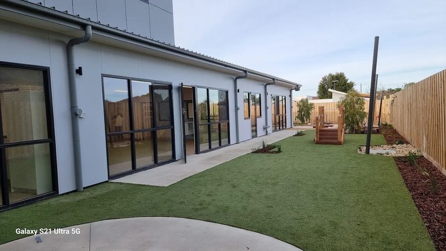 Freshly painted child care centre and courtyard
