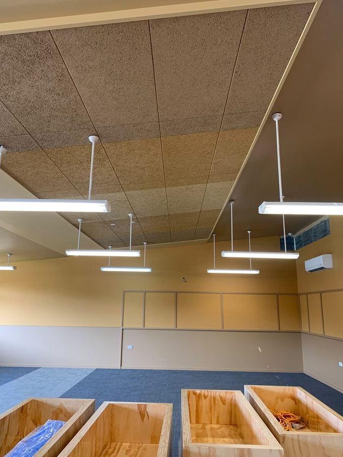 Commercial fit-out with acoustic ceiling panels